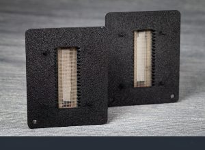 stock photo flat foil ribbon tweeters presented against a gray background photo taken under artificial light 2073662207 transformed